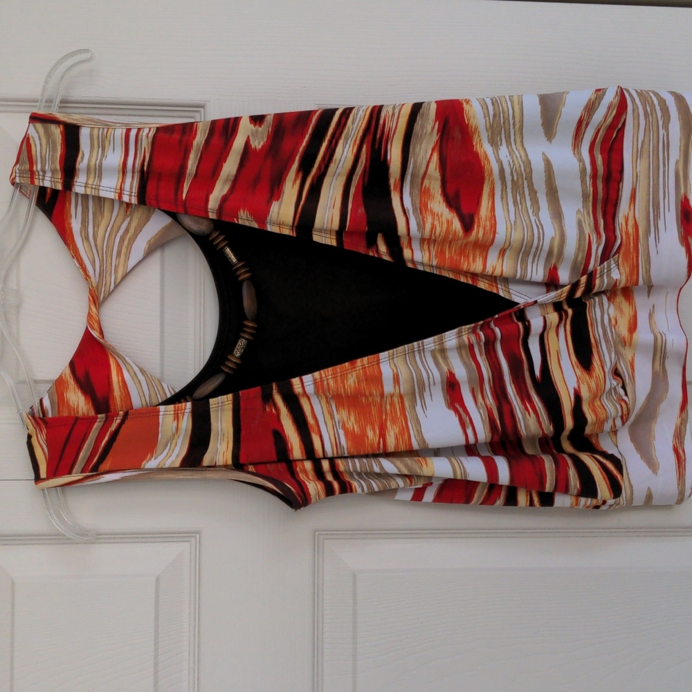Sleeveless top with attached necklace